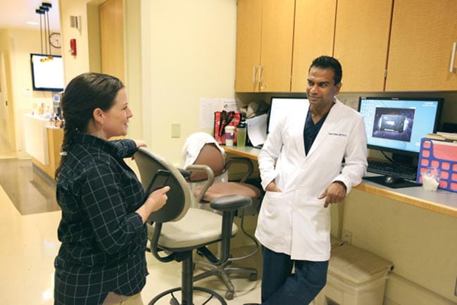 Dietitian Dr. Nina Crowley (left) confers with Dr. Rana Pullatt about their patient’s eating habits.