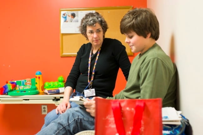 Dr. Jane Charles with child with autism