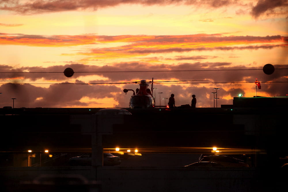 A coast guard helicopter sits atop the downtown helipad where patients are offloaded for care at MUSC.