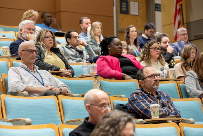 audience members listen to a lecture