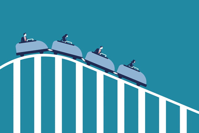 Illustration of cars descending a roller coaster over a light blue background.